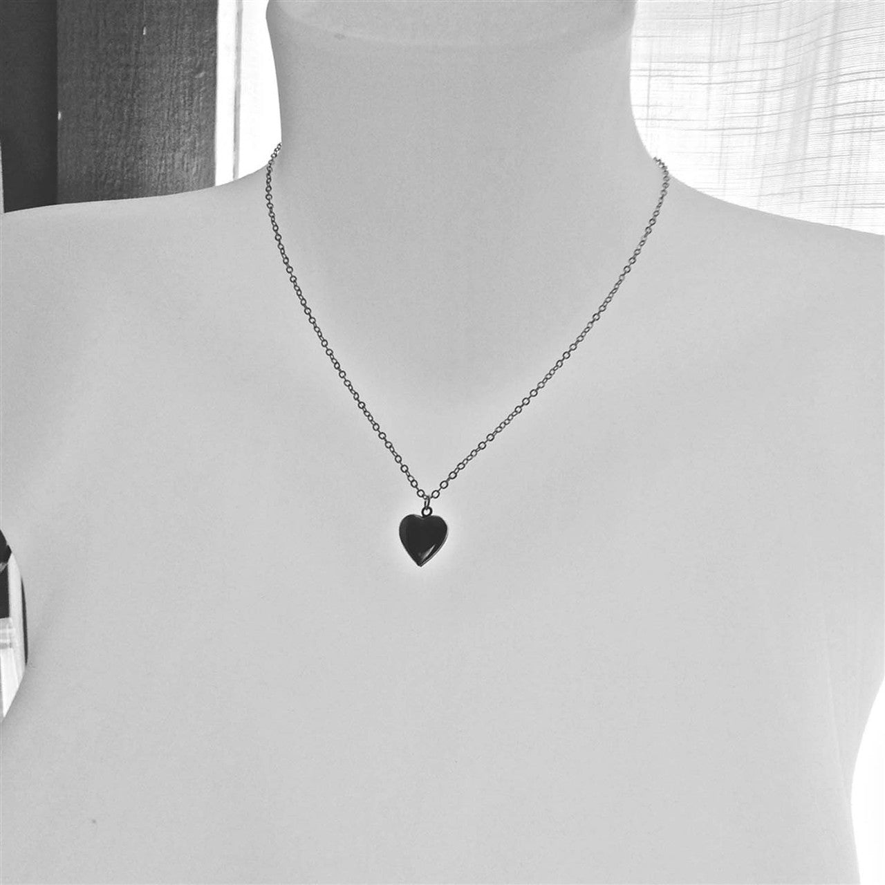 Total Eclipse Tiny Heart Shaped Locket in Gold