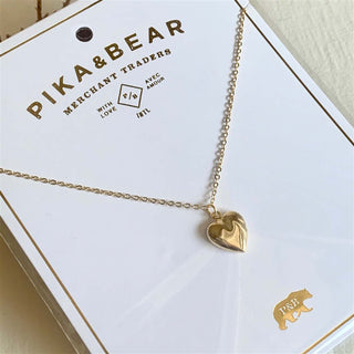 Total Eclipse Tiny Heart Shaped Locket in Gold