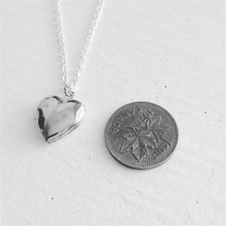 Total Eclipse Tiny Heart Shaped Locket in Silver