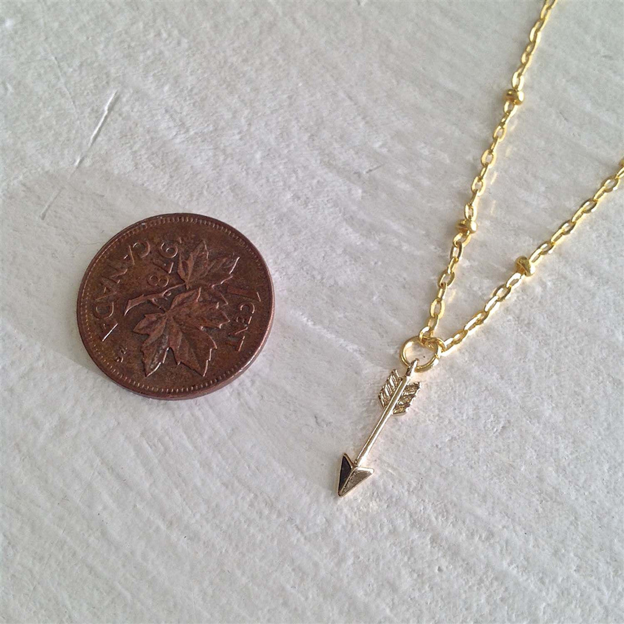 Bullseye Tiny Arrow Charm Necklace in Gold
